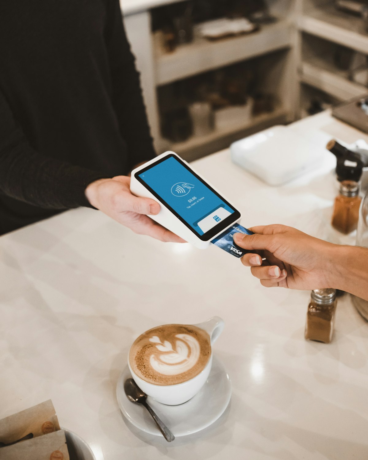 Customer reviewing restaurant bill and service charge lines